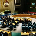 유엔 안보리 결의안 분석 - **Prompt 1: The Heart of Global Diplomacy in Action**
"A wide-angle, high-definition photographi...